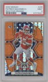Patrick Mahomes II from the 2022 Panini Mosaic set featuring a Reactive Orange parallel graded by PSA and given an overall grade of 9.