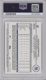 Jasson Dominguez from the 2024 Topps  set featuring a Orange Crackle Foil parallel graded by PSA and given an overall grade of 10.