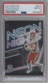 Travis Kelce from the 2023 Panini Spectra set graded by PSA and given an overall grade of 10.