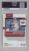 Brock Purdy from the 2022 Panini Donruss Optic set featuring a Pink parallel graded by PSA and given an overall grade of 9.