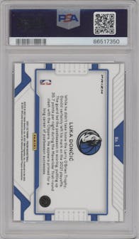 Luka Doncic from the 2021-22 Panini Prizm  set featuring a Fast Break parallel graded by PSA and given an overall grade of 9.