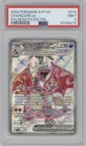 Charizard ex from the 2024 Pokemon SV set featuring a Paldean Fates Tera Charizard ex tin parallel graded by PSA and given an overall grade of 9.