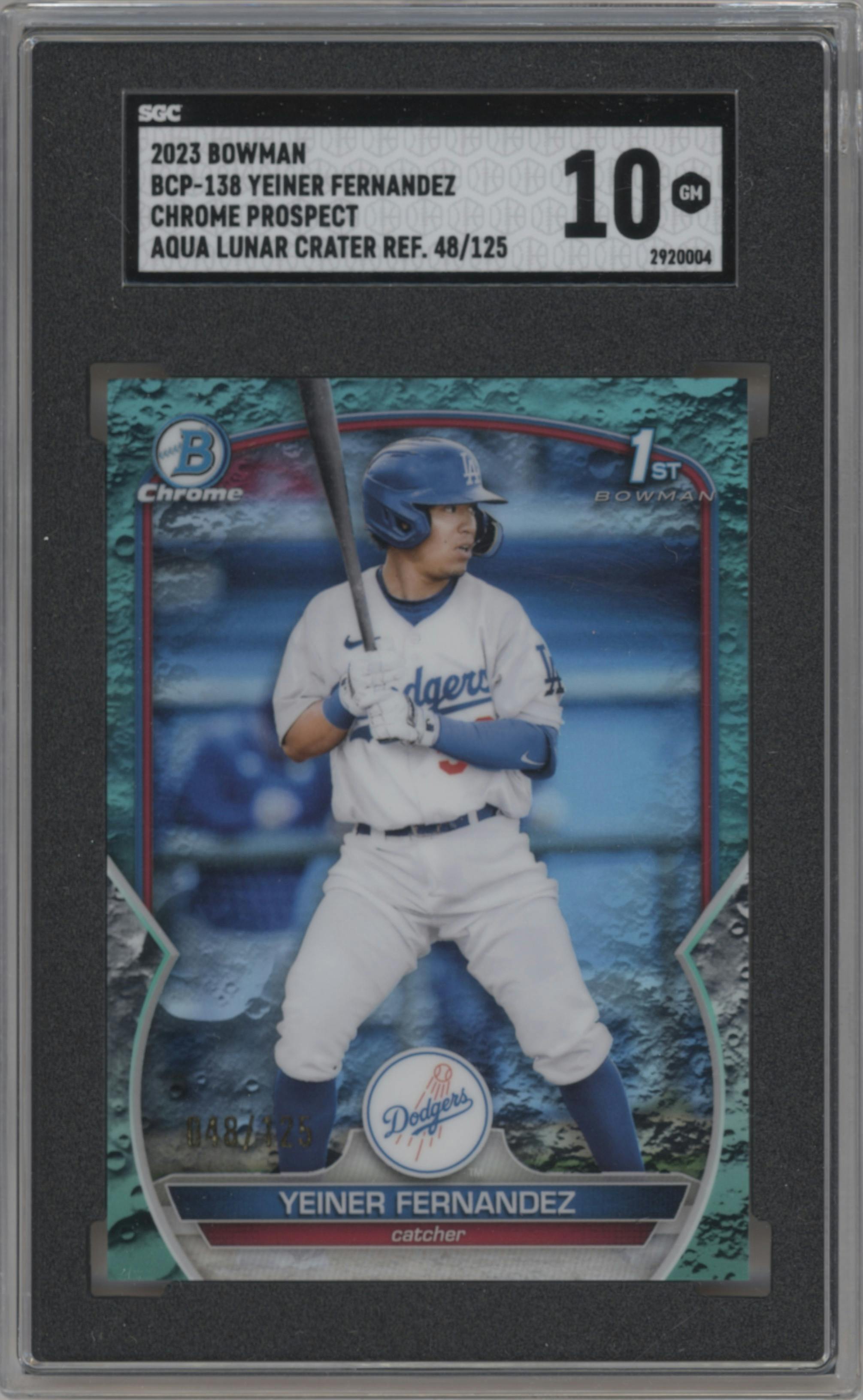 Yeiner Fernandez from the 2023 Bowman  set featuring a Aqua Lunar Crater Refractor parallel graded by SGC and given an overall grade of 10.