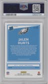 Jalen Hurts from the 2020 Panini Donruss set featuring a Red & Green parallel graded by PSA and given an overall grade of 10.