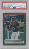 Jalen Hurts from the 2020 Panini Donruss set featuring a Red & Green parallel graded by PSA and given an overall grade of 10.