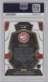 Trae Young from the 2022-23 Panini Select set featuring a Neon Purple Pulsar parallel graded by PSA and given an overall grade of 9.