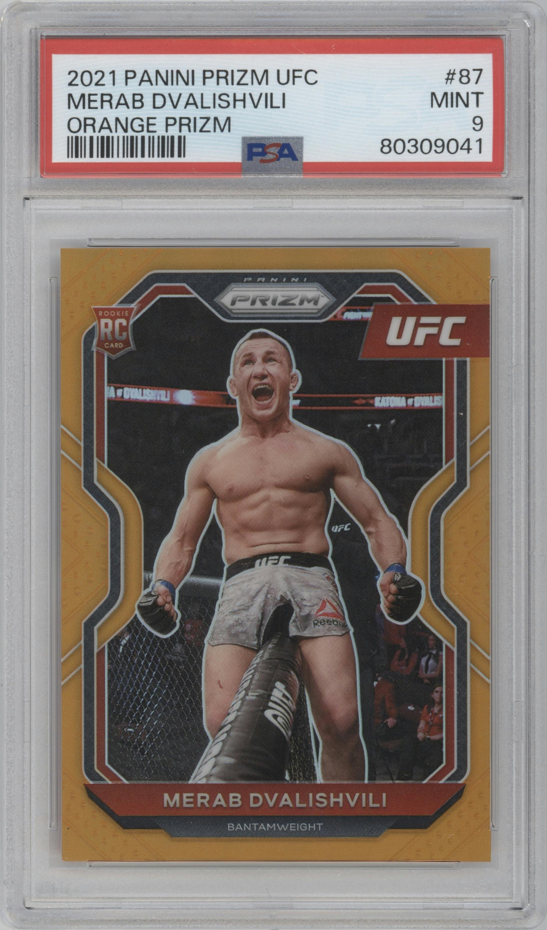 Merab Dvalishvili from the 2021 Panini Prizm UFC set featuring a Orange Prizm parallel graded by PSA and given an overall grade of 9.