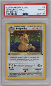 Dragonite from the 1999 Pokemon set graded by PSA and given an overall grade of 8.