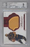 LeBron James   from the 2014-15 Panini Flawless set featuring a Ruby parallel graded by Beckett and given an overall grade of 9.