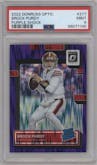 Brock Purdy from the 2022 Panini Donruss Optic set featuring a Purple Shock parallel graded by PSA and given an overall grade of 9.