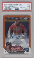 Chipper Jones from the 2023 Topps Chrome Update set featuring a Orange parallel graded by PSA and given an overall grade of 9.