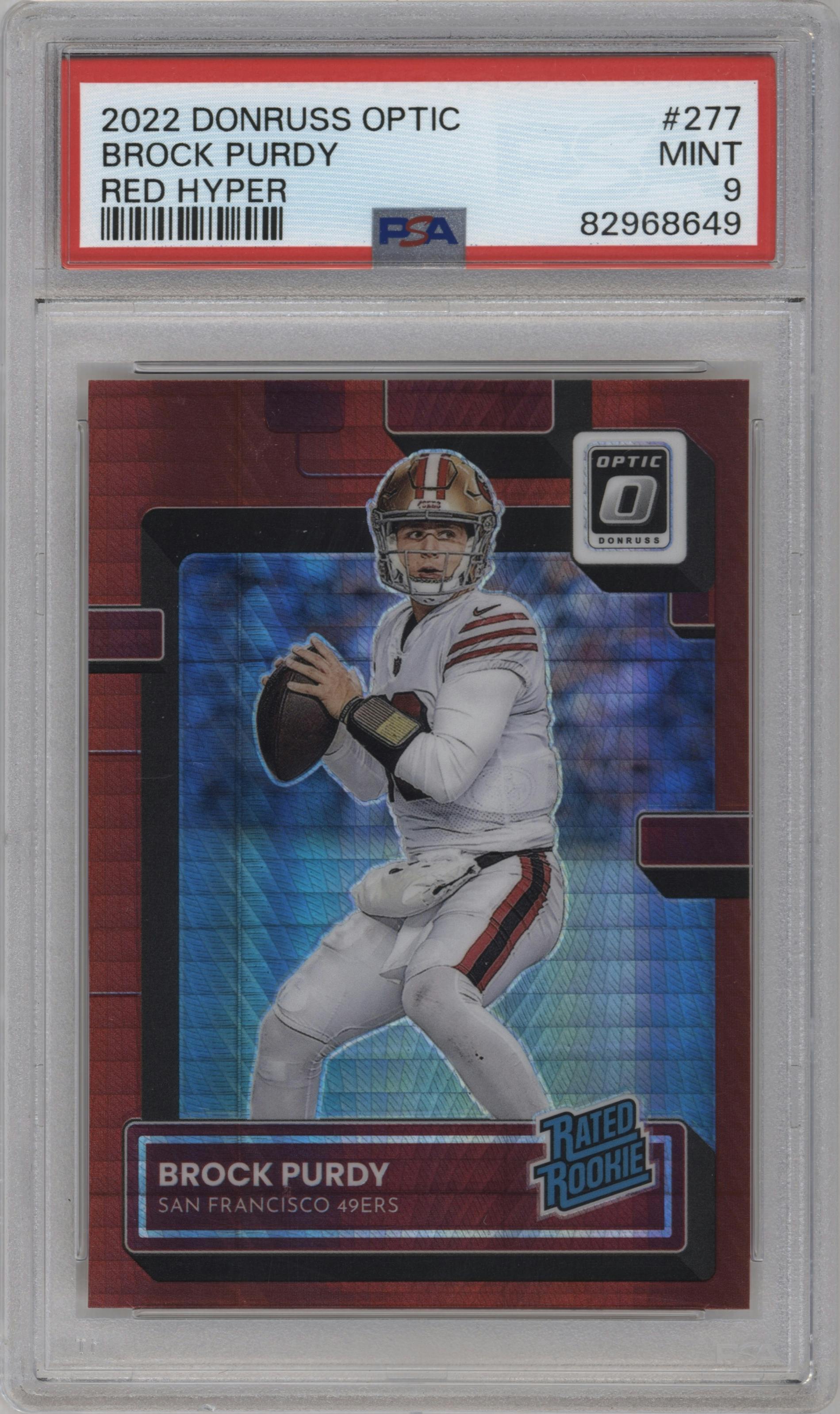 Brock Purdy from the 2022 Panini Donruss Optic set featuring a Hyper Red parallel graded by PSA and given an overall grade of 9.