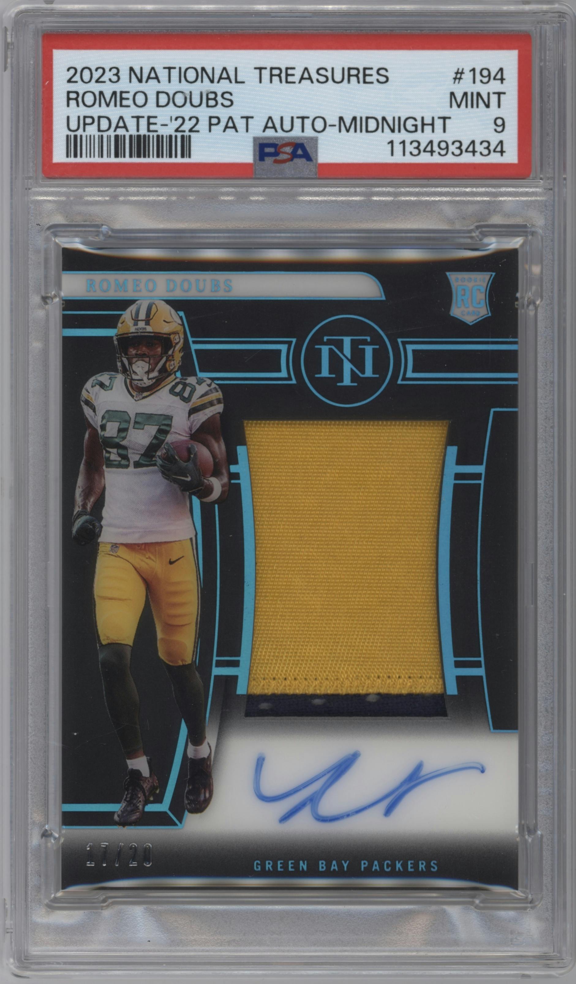 Romeo Doubs from the 2023 Panini National Treasures set featuring a Midnight parallel graded by PSA and given an overall grade of 9.