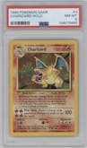 Charizard from the 1999 Pokemon set graded by PSA and given an overall grade of 8.