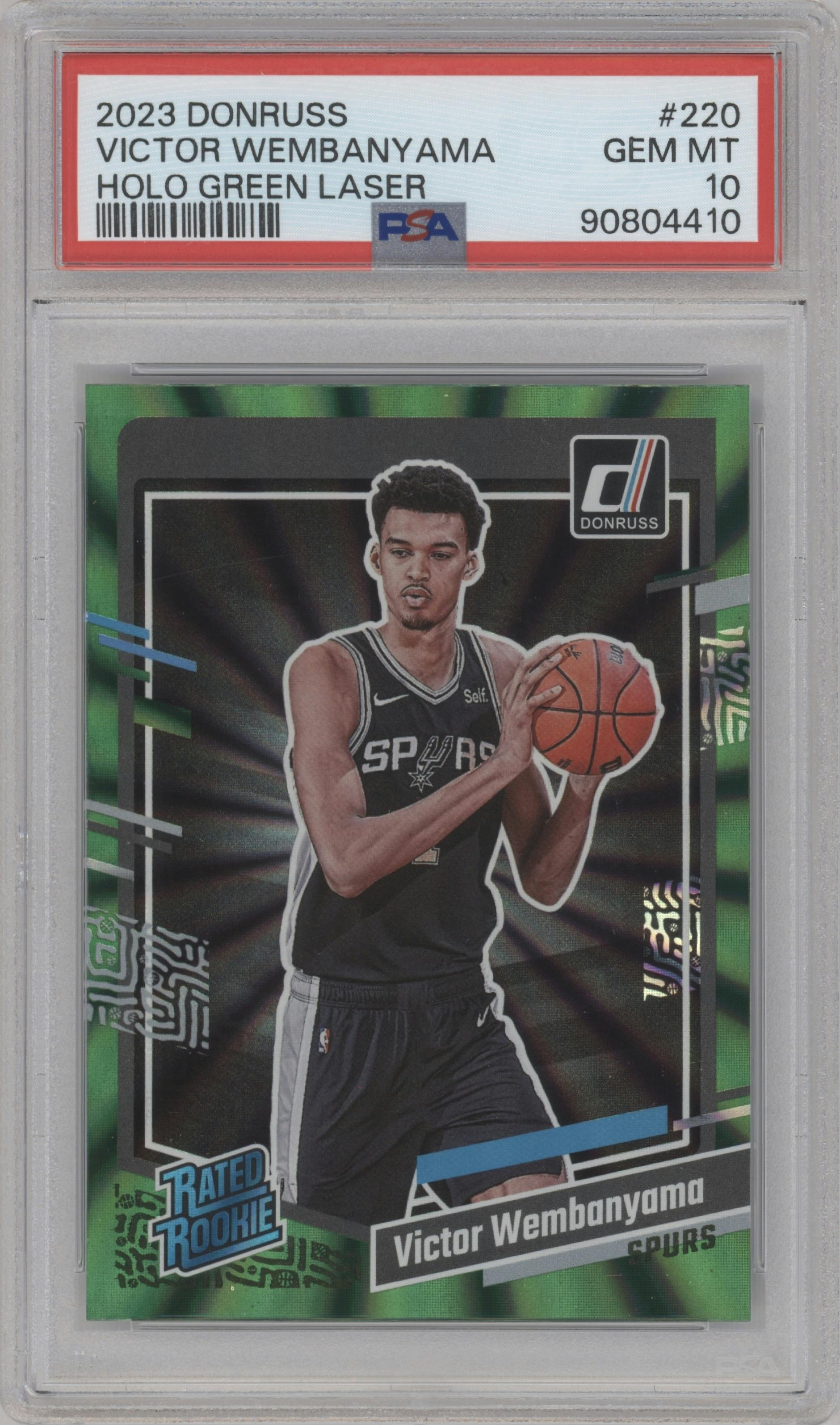 Victor Wembanyama from the 2023-24 Panini Donruss set featuring a Green Holo Laser  parallel graded by PSA and given an overall grade of 10.