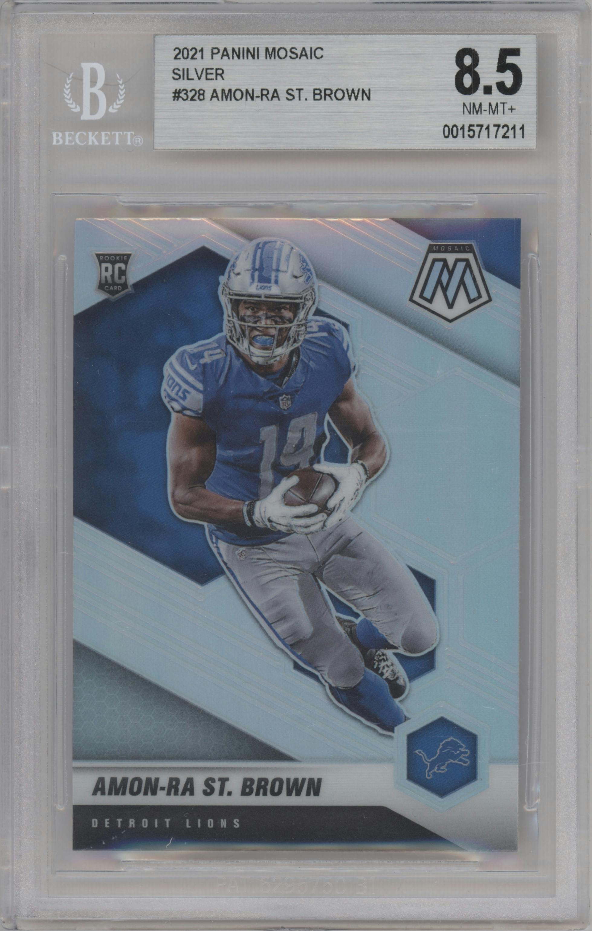 Amon-Ra St. Brown from the 2021 Panini Mosaic set featuring a Silver parallel graded by Beckett and given an overall grade of 8.5.