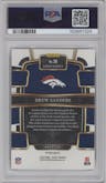 Drew Sanders from the 2023 Panini Select set featuring a Gold Dragon Scale parallel graded by PSA and given an overall grade of 10.