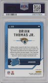 Brian Thomas Jr. from the 2024 Donruss set featuring a Red Pandora parallel graded by PSA and given an overall grade of 9.