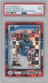 Brian Thomas Jr. from the 2024 Donruss set featuring a Red Pandora parallel graded by PSA and given an overall grade of 9.