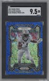 Alvin Kamara from the 2023 Panini Prizm set featuring a Blue Sparkle parallel graded by SGC and given an overall grade of 9.5.