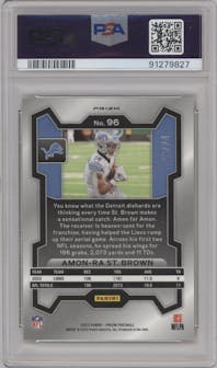 Amon-Ra St. Brown from the 2023 Panini Prizm set featuring a Gold Sparkle parallel graded by PSA and given an overall grade of 10.