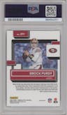 Brock Purdy from the 2022 Panini Donruss Optic set featuring a Stars parallel graded by PSA and given an overall grade of 9.
