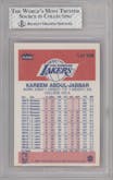 Kareem Abdul-Jabbar from the 1986-87 Fleer set graded by Beckett and given an overall grade of 7.