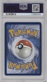 Mimikyu from the 2024 Pokemon SV set featuring a Paldean Fates Elite Trainer Box parallel graded by PSA and given an overall grade of 9.