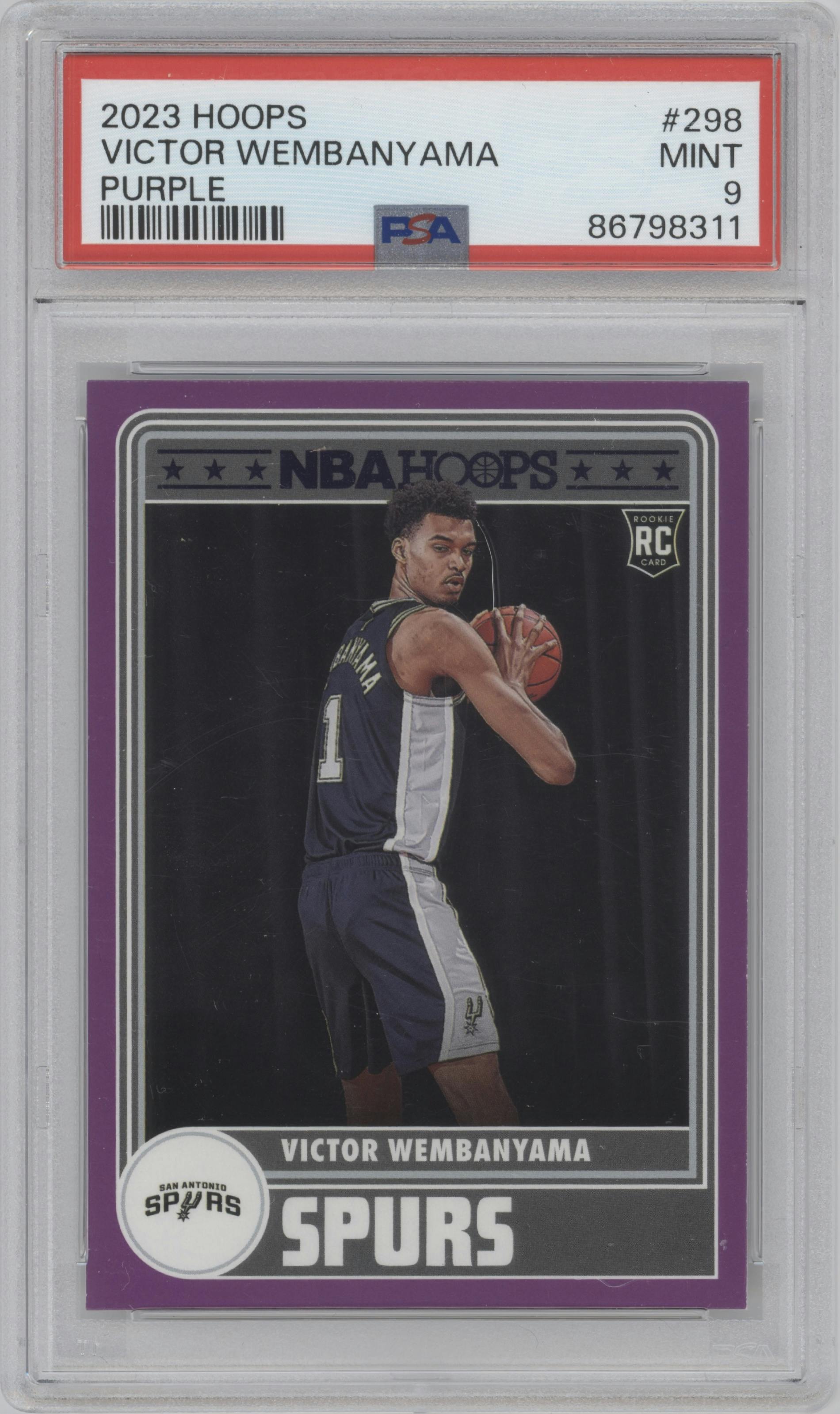 Victor Wembanyama from the 2023-24 Panini NBA Hoops set featuring a Purple parallel graded by PSA and given an overall grade of 9.
