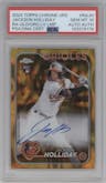 Jackson Holliday from the 2024 Topps Chrome Update set featuring a Lava Lamp Gold / Orange Refractors parallel graded by PSA and given an overall grade of 10.