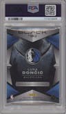 Luka Doncic from the 2023-24 Panini Black set featuring a Platinum parallel graded by PSA and given an overall grade of 9.