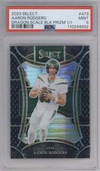 Aaron Rodgers from the 2023 Panini Select set featuring a Black Dragon Scale parallel graded by PSA and given an overall grade of 9.