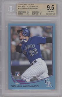 Nolan Arenado from the 2013 Topps Update set featuring a Walmart Blue parallel graded by Beckett and given an overall grade of 9.5.
