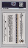 Jackson Chourio from the 2024 Topps Gilded Collection set featuring a Blue/Gold parallel graded by PSA and given an overall grade of 10.