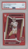 Brock Purdy from the 2022 Panini Rookies & Stars set featuring a Red parallel graded by PSA and given an overall grade of 9.