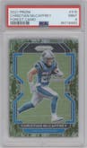 Christian McCaffrey from the 2021 Panini Prizm set featuring a Forest Camo parallel graded by PSA and given an overall grade of 9.