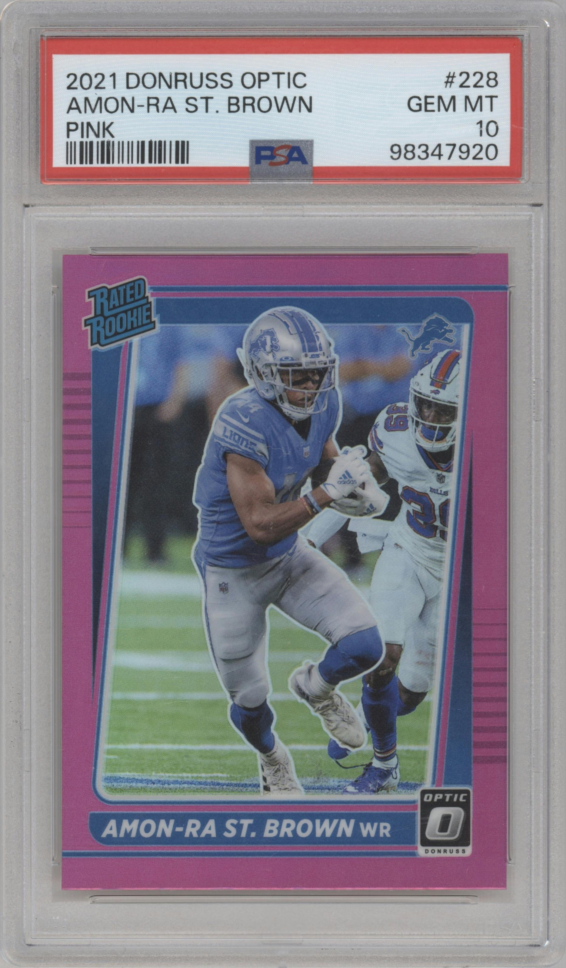 Amon-Ra St. Brown from the 2021 Panini Donruss Optic set featuring a Pink parallel graded by PSA and given an overall grade of 10.