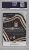 Christian McCaffrey from the 2022 Panini Select Draft Picks set featuring a Red & Green Squares parallel graded by PSA and given an overall grade of 9.
