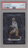 Brock Purdy from the 2023 Panini Obsidian set featuring a Electric Etch Purple parallel graded by PSA and given an overall grade of 10.
