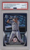 Jasson Dominguez from the 2023 Bowman Mega Box set featuring a Navy Refractor parallel graded by PSA and given an overall grade of 10.