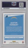 Justin Herbert from the 2020 Panini Donruss Optic set featuring a Holo parallel graded by PSA and given an overall grade of 9.