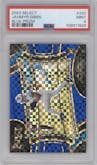 Jahmyr Gibbs from the 2023 Panini Select set featuring a Blue Prizm parallel graded by PSA and given an overall grade of 9.