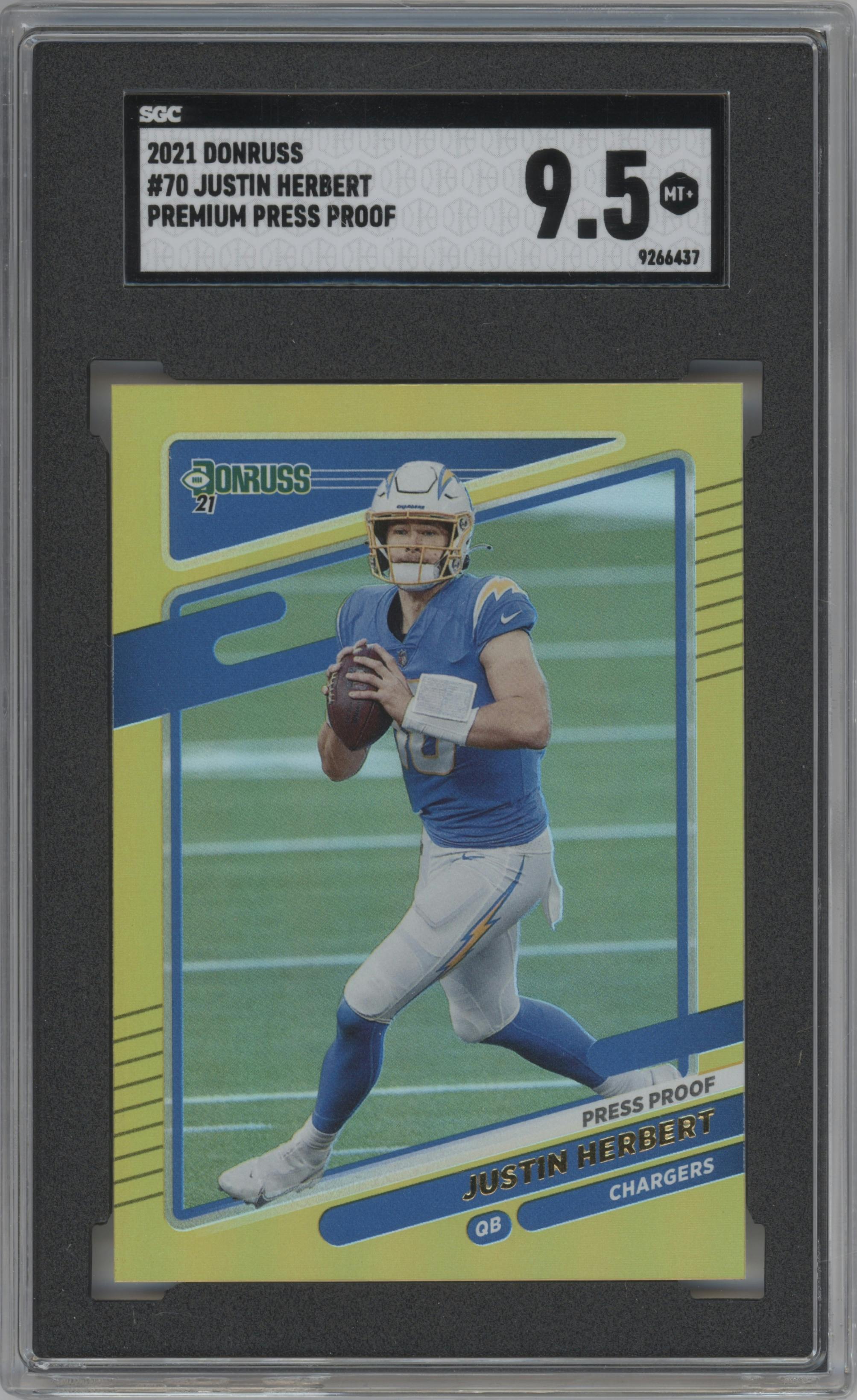 Justin Herbert from the 2021 Panini Donruss set featuring a Press Proof Premium parallel graded by SGC and given an overall grade of 9.5.