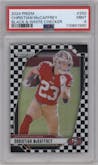 Christian McCaffrey from the 2024 Panini Prizm set featuring a Black & White Checker parallel graded by PSA and given an overall grade of 9.