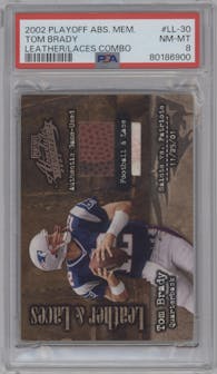 Tom Brady from the 2002 Playoff Absolute Memorabilia set featuring a Combos parallel graded by PSA and given an overall grade of 8.