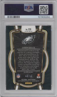 Jason Kelce from the 2022 Panini Select set featuring a Red Prizm parallel graded by PSA and given an overall grade of 10.