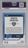 Brock Bowers from the 2024 Donruss set featuring a Red Pandora parallel graded by PSA and given an overall grade of 10.