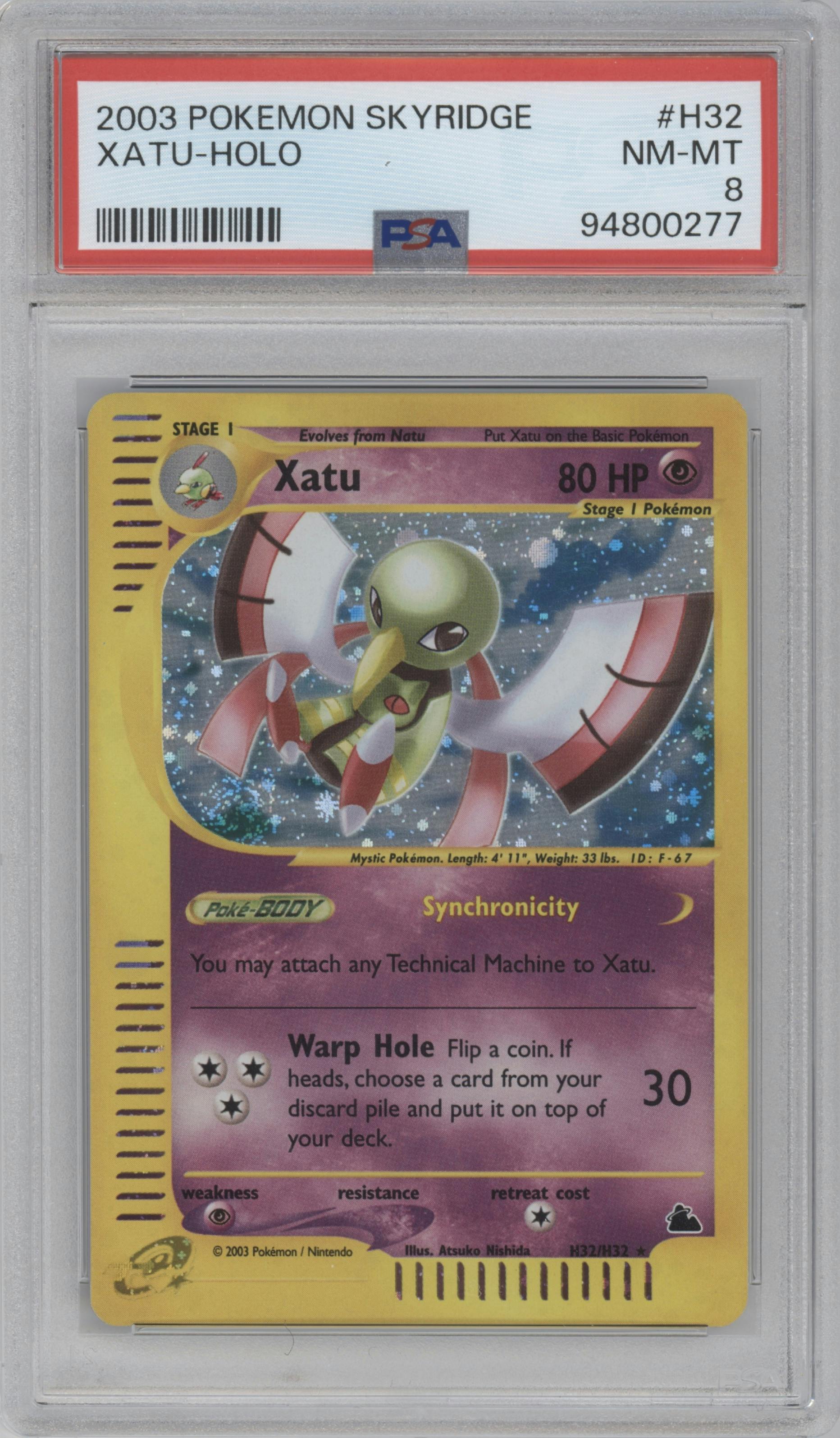 Xatu from the 2003 Pokemon E-CARD set graded by PSA and given an overall grade of 8.