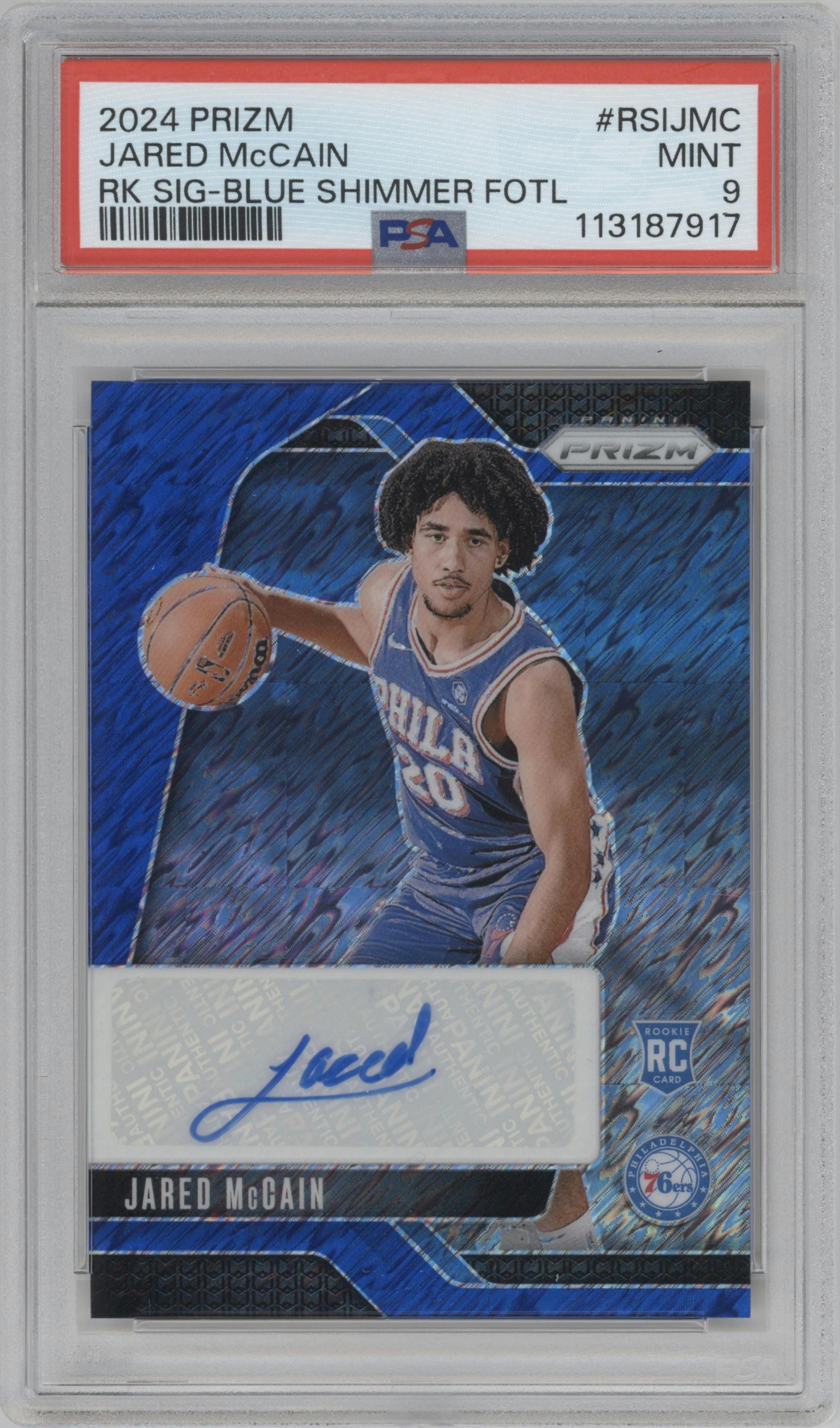 Jared McCain from the 2024-25 Panini Prizm set featuring a Blue Shimmer Prizm FOTL parallel graded by PSA and given an overall grade of 9.
