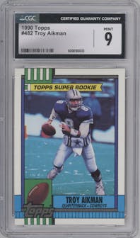 Troy Aikman from the 1990 Topps set graded by CSG and given an overall grade of 9.